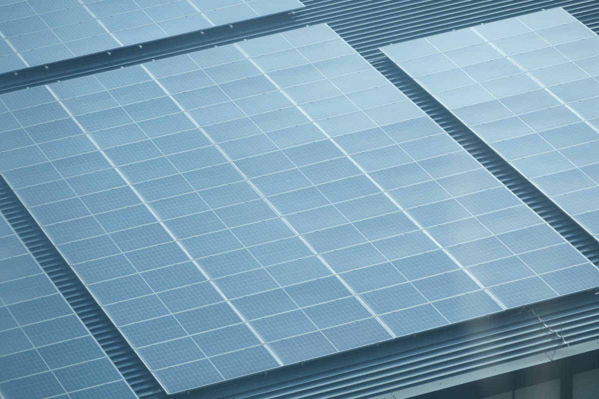 A close-up of solar panels installed on a rooftop.